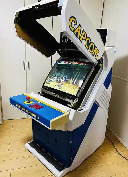 Capcom Q25 with its lid open