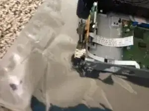 Pop the clasp, daughterboard comes out. Don’t forget, the ribbon cables are still connected.