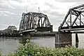 BNSF Railway bridge across the Columbia River at Portland, Oregon, showing the swing-span section turning.