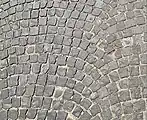Square setts in an arc pattern