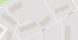 Screenshot of OSM showing row houses in Salaspils digitized as one building instead of multiple ones.