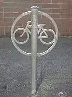 Post and ring style bike bollard with a two bike capacity.