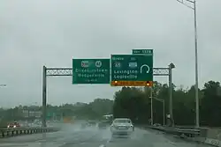 Right: junction:ref=137B destination:ref=I 65 North destination:street:to=Bluegrass Parkway destination=Lexington;Louisville maxspeed:advisory=20 mph