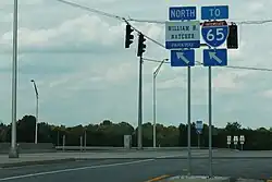 destination:street=William H. Natcher Parkway North destination:ref:to=I 65