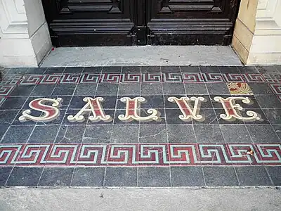 historic=epigraph + location=surface + epigraph=welcome + inscription=SALVE