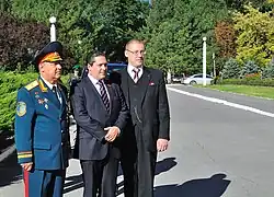 George, aged 29, in suit and tie