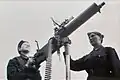 Soviet female military personnel with the Maxim M1910/30 machine gun on the Kondakov M1928 anti-aircraft tripod, 1941