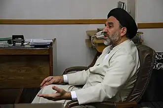 A cleric wearing a qabā