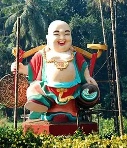 Statue of Budai in the Chinese style at Chalakudy, Kerala, India