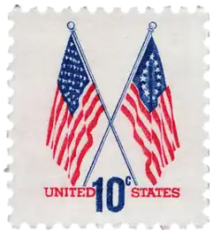 10¢ stamp released in 1973, showing a 50-star flag and a Betsy Ross flag together, to commemorate the United States Bicentennial.