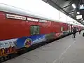 12560 Shiv Ganga Express – Pantry car coach with Prayagraj Kumbh 2019 decal