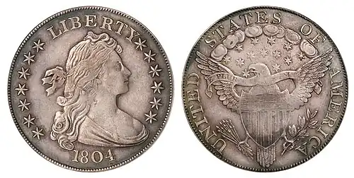 Both sides of a coin depicting an allegorical woman and a heraldic eagle