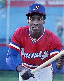 A baseball player in red and white