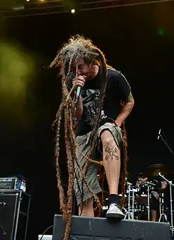 Brian Fair performing with Shadows Fall in 2014