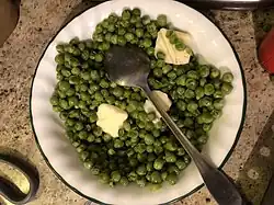 Steamed peas with butter