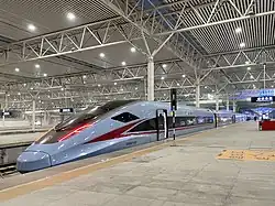 CR300AF-2027, allocated to China Railway Kunming Group, operating as C5983, stopped at Chengdu East railway station.