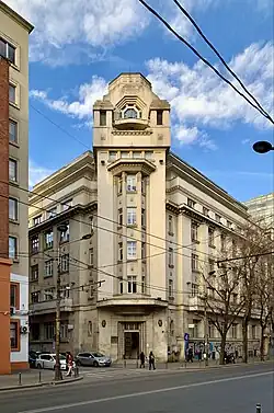 Early - Central Social Insurance Company Building (now the Asirom Building, Bulevardul Carol no. 31-33), Bucharest, by Ion Ionescu, c.1930[84]