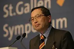 Image of Semmoto speaking at the St.Gallen Symposium