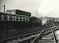 7029 leaving Birmingham Snow Hill working "The Zulu" in Mar 1967.