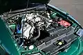 1999 SVT Cobra convertible engine with a modified intake and battery.