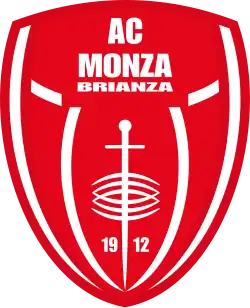 A red and white badge with "AC MONZA BRIANZA" written on it