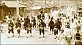 A Korean Drum & Bugle corps escorts the Grand-Master of the Emperor's royal stables through Seoul in 1903.