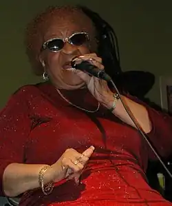 Adams performing at Sushi Blues in December 2006