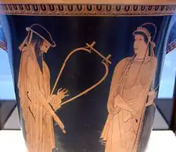 Alcaeus and Sappho holding their lyres and plectra. Attic red-figure calathus, ca. 470 BC, Staatliche Antikensammlungen (Inv. 2416)