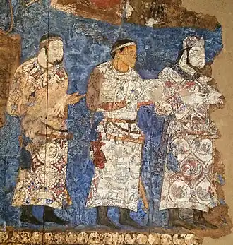 Ambassadors from Chaganian (central figure, inscription of the neck), and Chach (modern Tashkent) to king Varkhuman of Samarkand. 648-651 AD, Afrasiyab murals, Samarkand.[140][141][142] The delegate to the right has a Simurgh design on his dress.[143]