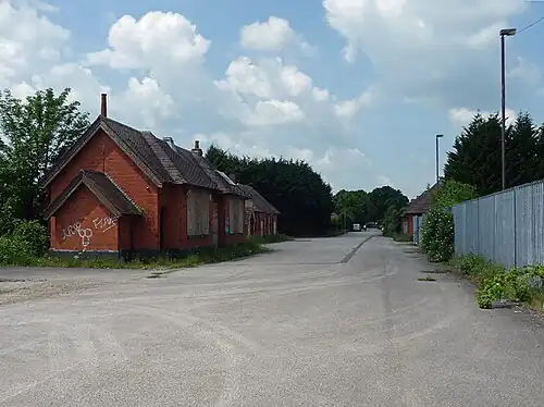 Number 5 Mess Room, a listed building on the site[29] (the Weigh Offices, also listed, are behind the Mess Room[30])