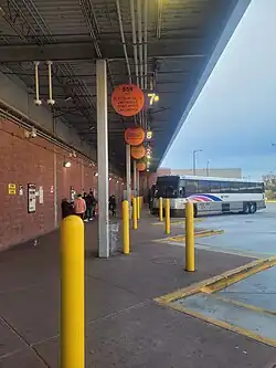 Bus gates where passengers wait to board, March 2024