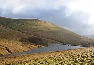 An upland lake surrounded by hills