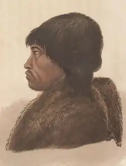 A profile portrait of Tatannuaq in fur clothing