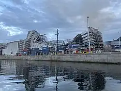 The damaged roof of Børsen and the scaffolding caving in