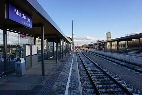 Canopy-covered platform next to two tracks