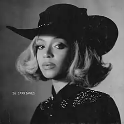Black-and-white photo of Beyoncé wearing a cowboy hat and a black jacket
