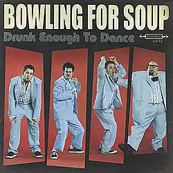 The cover consists of four men goofing around in powder blue tuxedos.