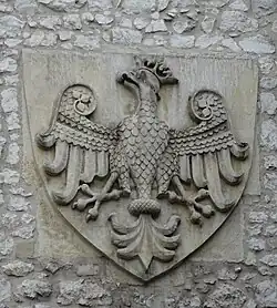 Bas-relief of Piast Eagle, designed by Jan Matejko, over gate entrance