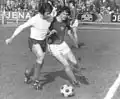 Lutz Eigendorf (right) in a duel with Harald Irmscher (left) of FC Carl Zeiss Jena during match on 1 March 1975.