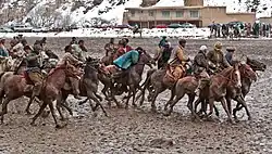 Image 19Players in a game of buzkashi, the national sport (from Culture of Afghanistan)