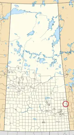 A map of the province of Saskatchewan showing 297 rural municipalities and hundreds of small Indian reserves. One is highlighted with a red circle.