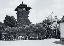 The tower and domed mosque main building.