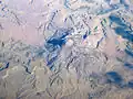 Oblique air photo of Cabezon Peak, facing north