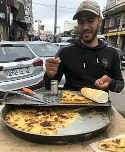 Street vendor selling Caliente in Tangier, Morocco