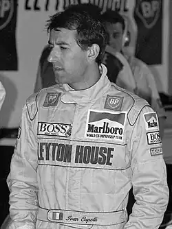 A black and white photograph of Ivan Capelli in 1991