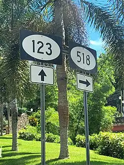 PR-123 south at PR-518 intersection in downtown Adjuntas