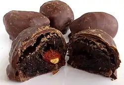 Prunes in chocolate with an almond in the middle