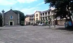 A church on the left and a high school on the right