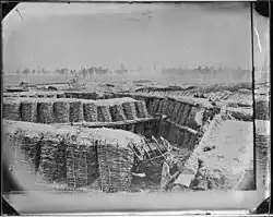 Fascine Trench Breastworks, Petersburg, Va. – NARA – 524792. Although identified as Confederate Trenches this is actually Union Fort Sedgwick aka "Fort Hell" which was opposite Fort Mahone aka "Fort Damnation"[99]
