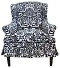 Damask slipcovered wing chair